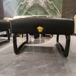 Elegant TV Stand with Upholstered Texture and Gold Metal Base